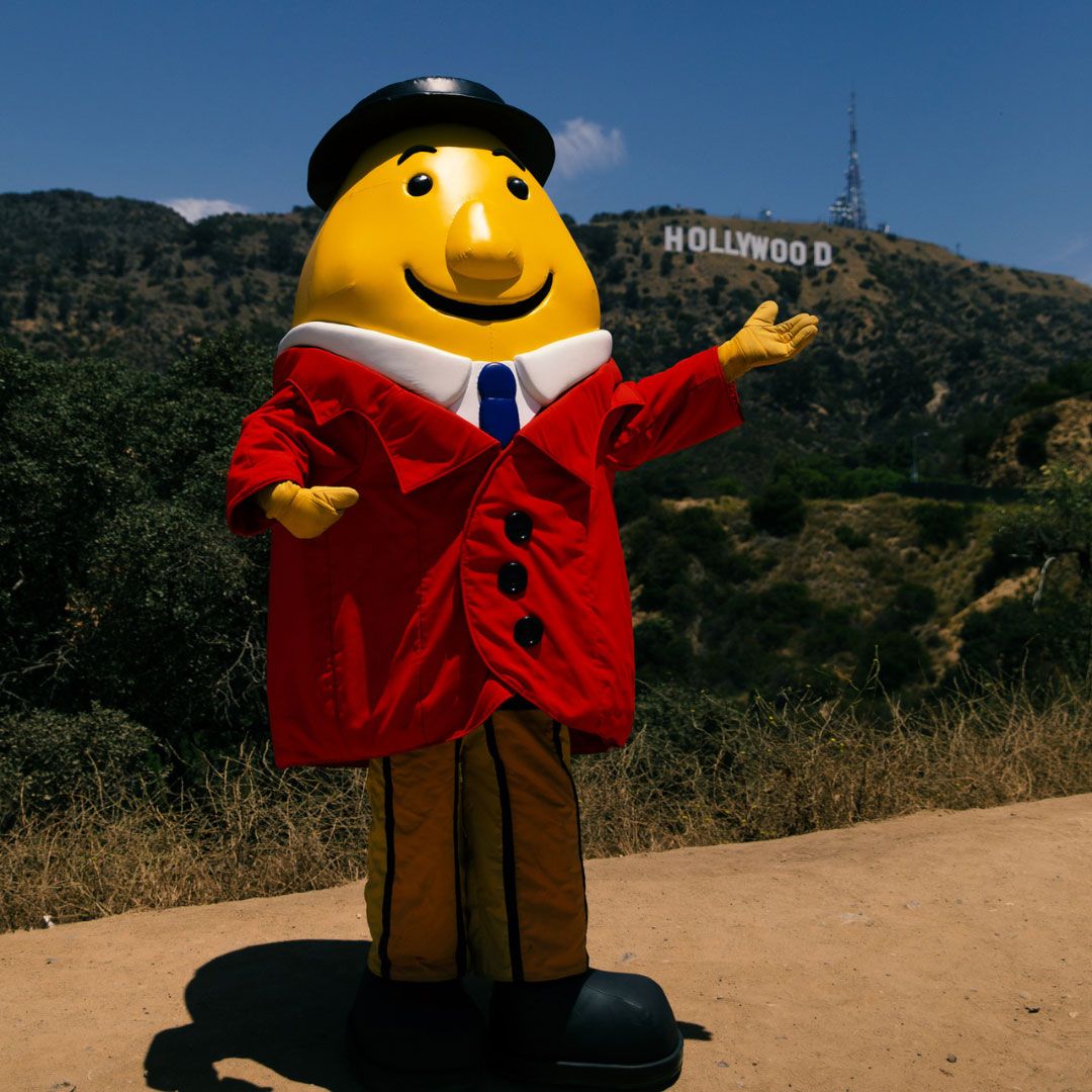 a statue of a man dressed in a suit and tie