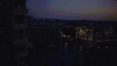 a view of a city at night from a window