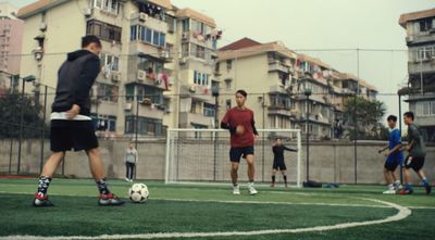 a group of young men playing a game of soccer