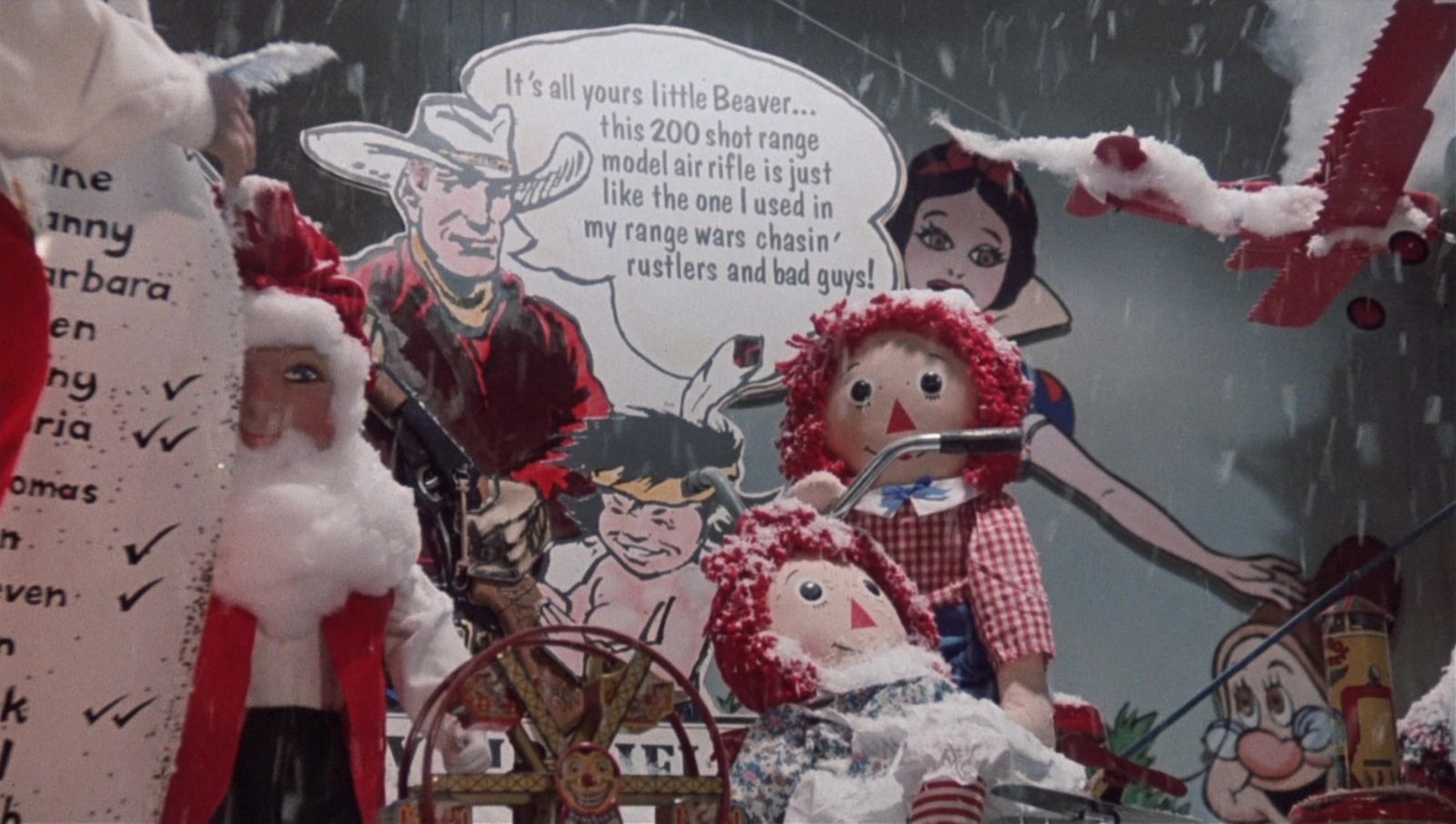 a display of santa claus and other christmas decorations