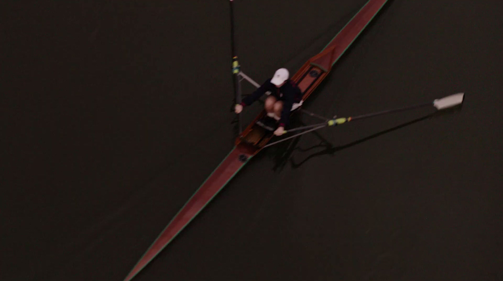 a man riding skis on top of a body of water