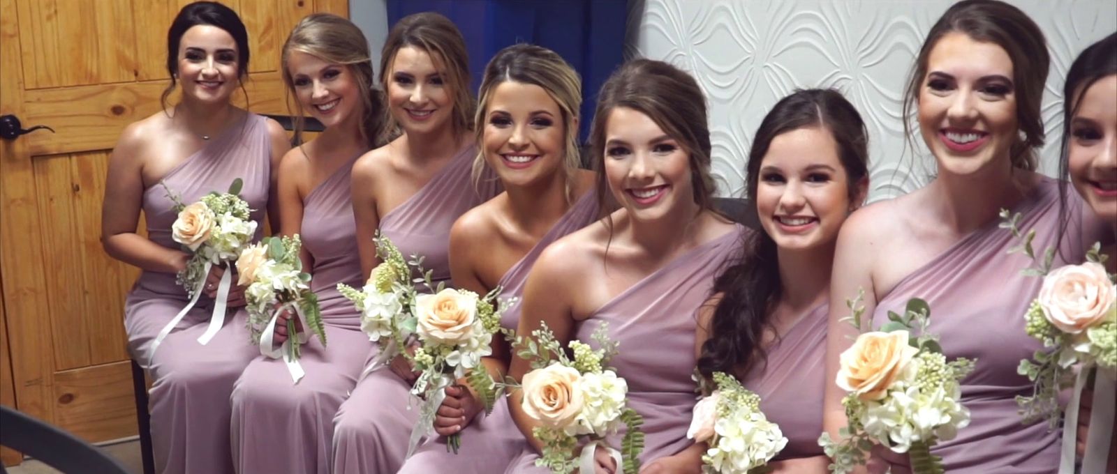 a group of women standing next to each other