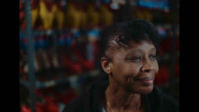 a woman is looking at the camera in a store