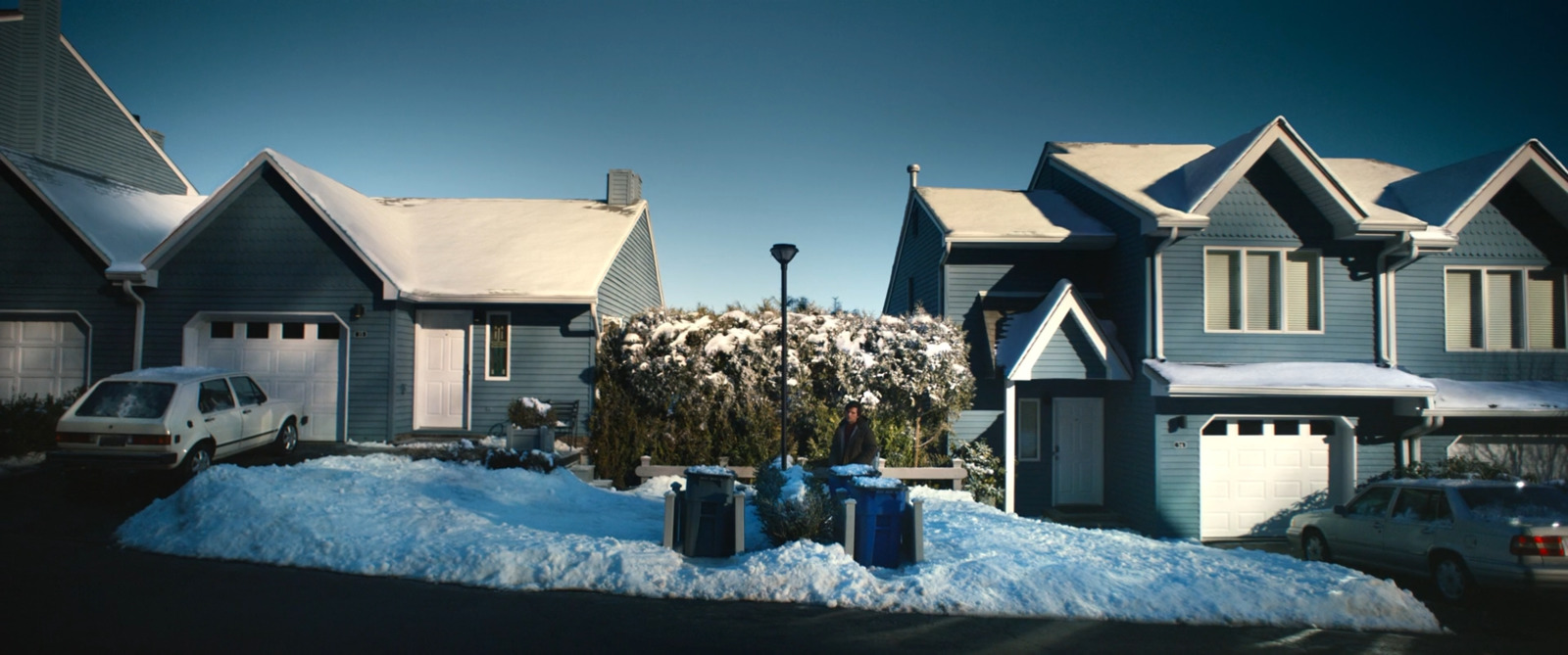 a bunch of houses that are covered in snow