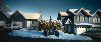 a bunch of houses that are covered in snow