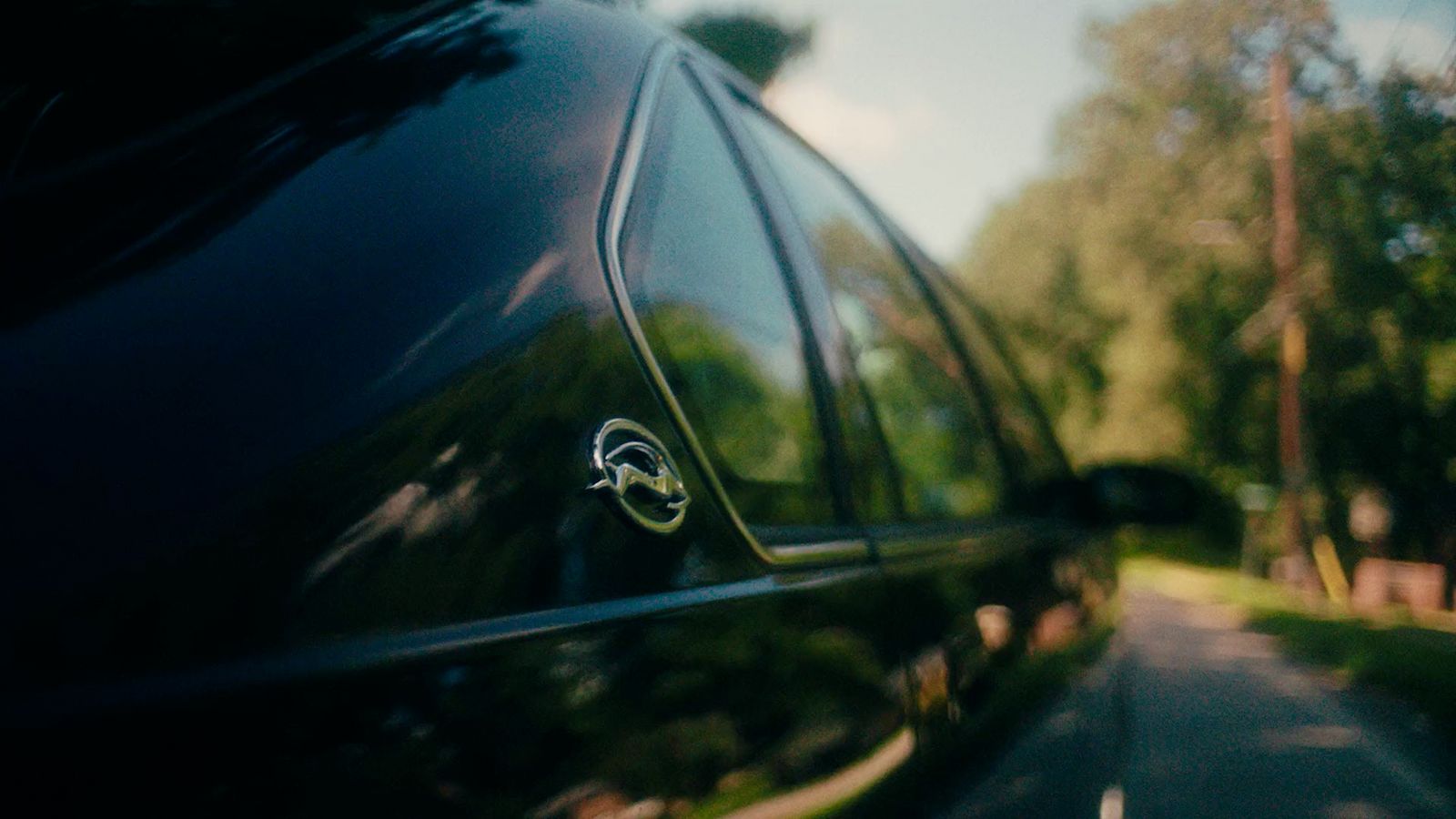 a close up of a car's rear view mirror