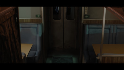 a train car with two seats and a door