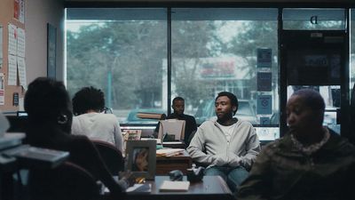 a group of people sitting around a table