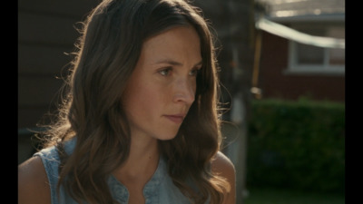 a close up of a person with long hair