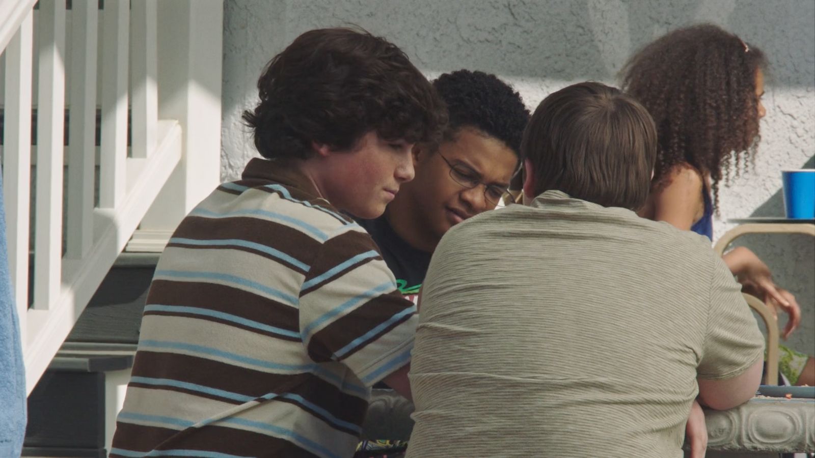 a group of young people standing next to each other