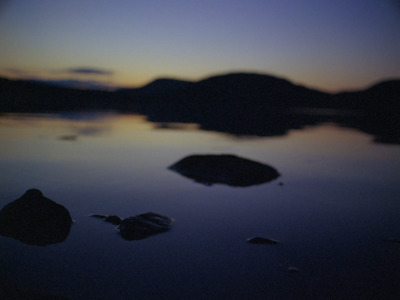 a picture of some rocks in the water