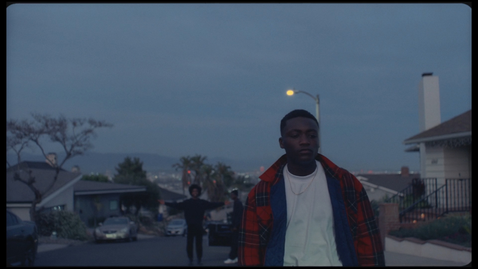 a man standing in the middle of a street