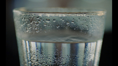 a close up of a glass of water