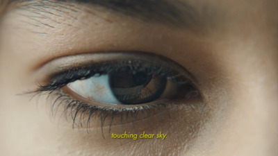 a close up of a person's blue eye