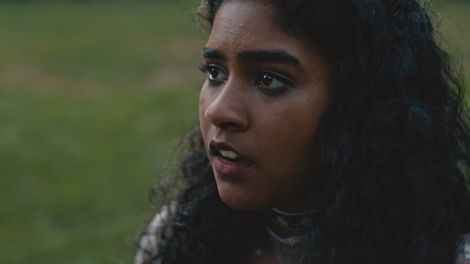 a close up of a person with long hair