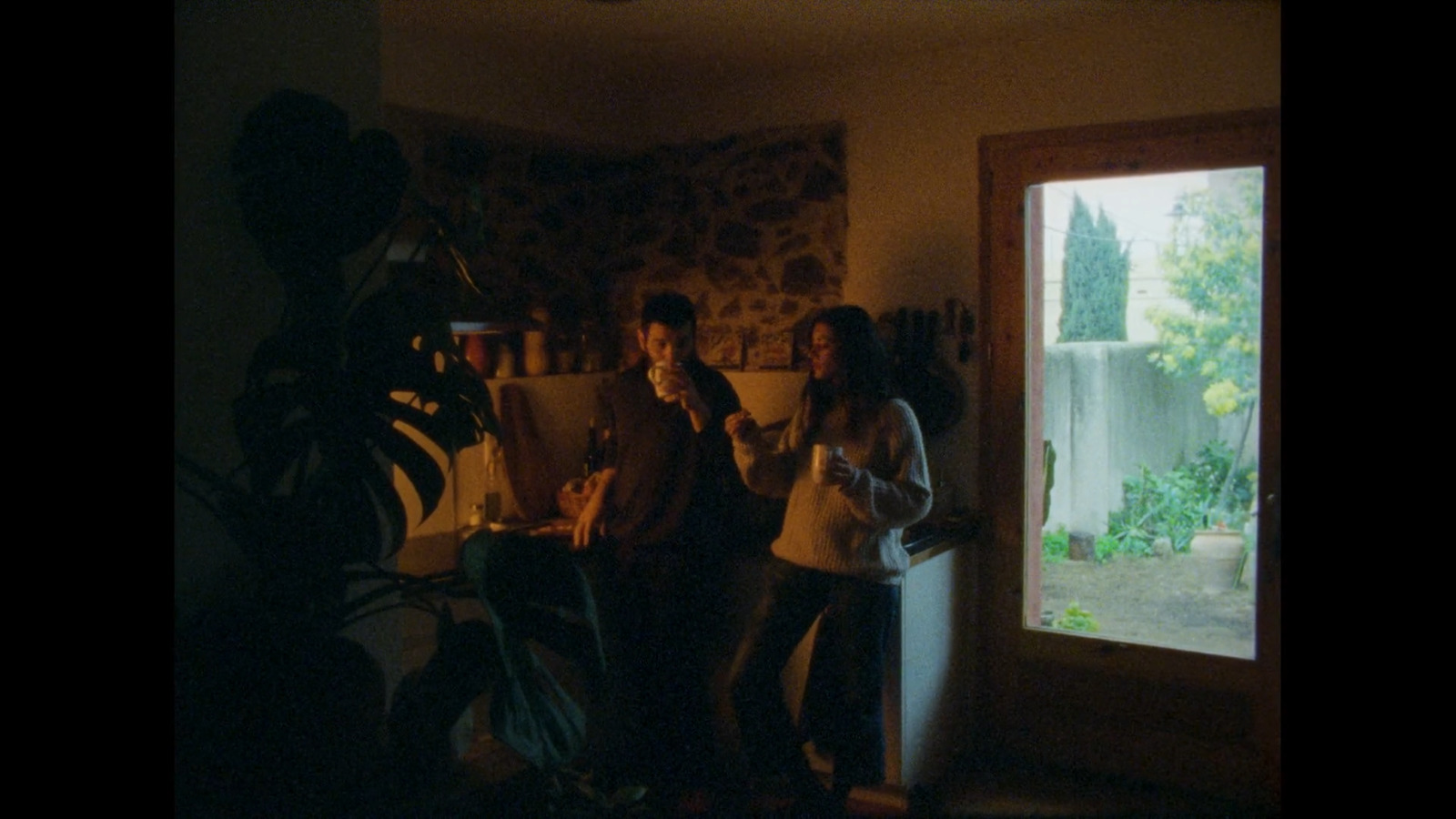 a group of people standing next to each other in a room