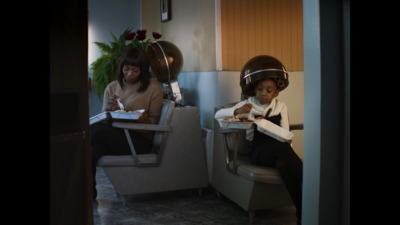 a couple of women sitting next to each other