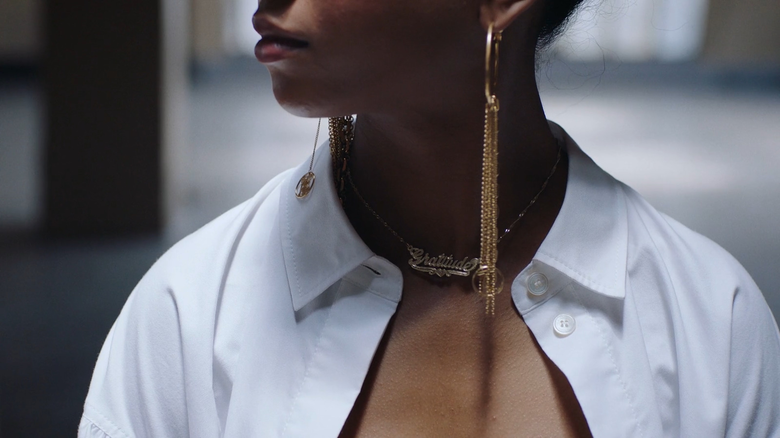 a close up of a person wearing a white shirt