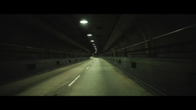 a dark tunnel with a light at the end