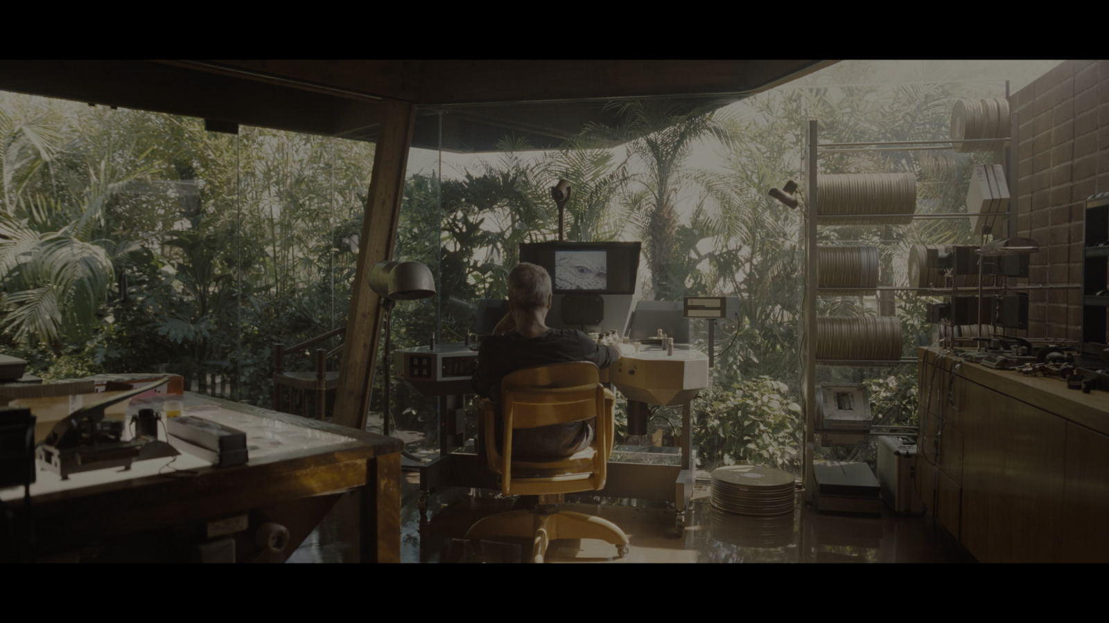 a person sitting in a chair in a room