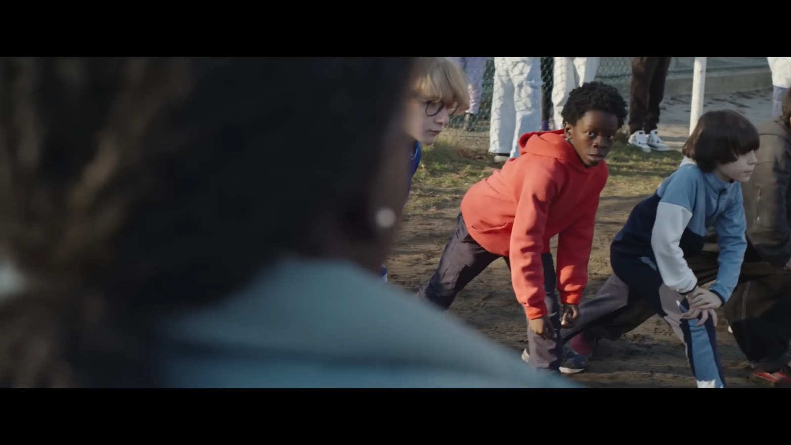 a group of people standing around each other