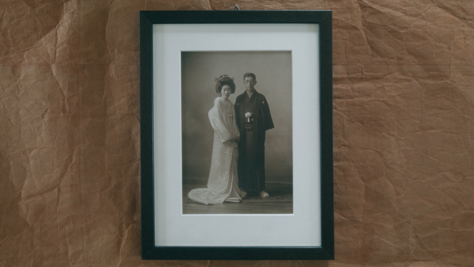 a black and white photo of a man and a woman