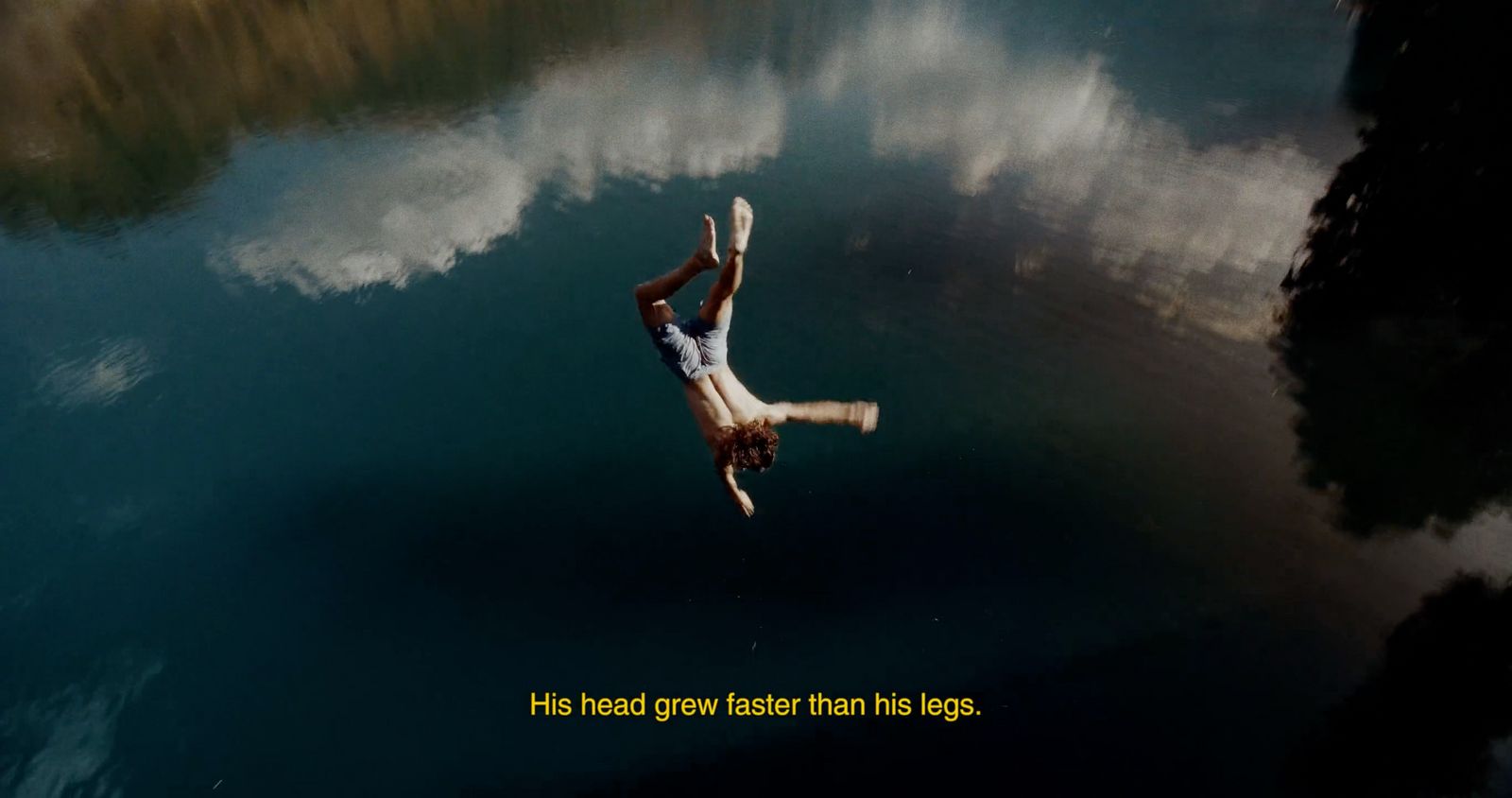 a person floating in a body of water