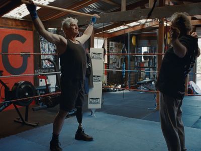 a man and a woman in a boxing ring