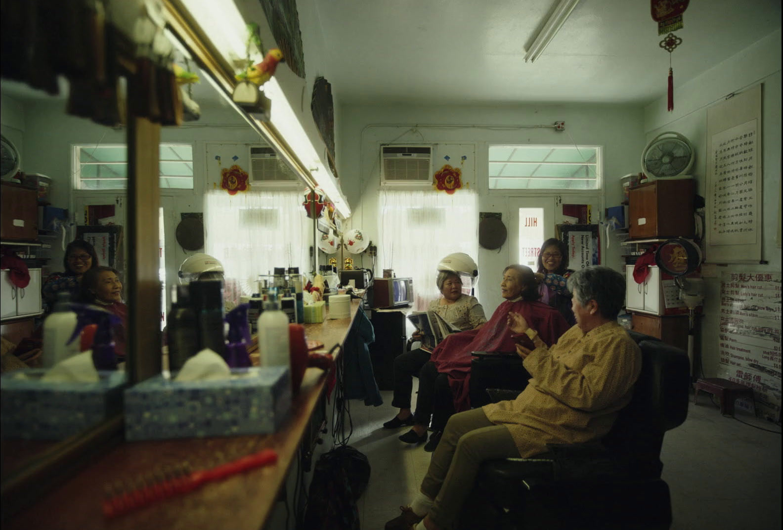 a group of people sitting around a room