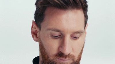 a close up of a person with a beard