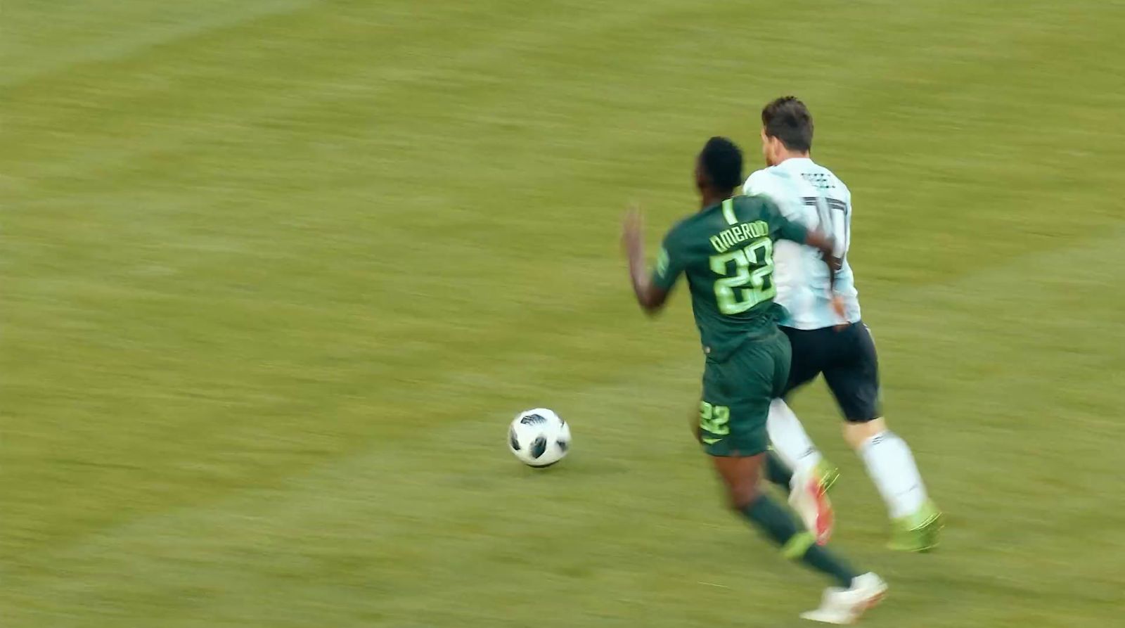 a couple of men playing a game of soccer