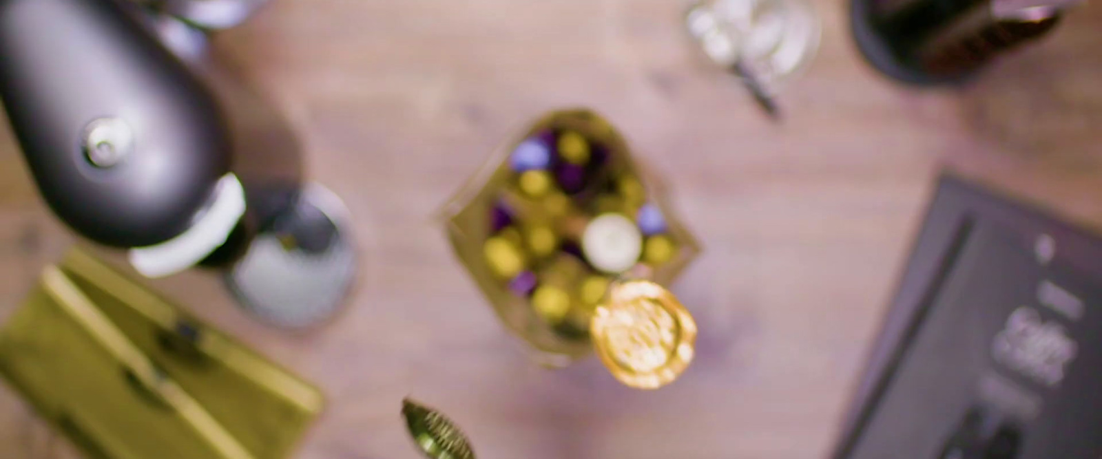 a close up of a wine bottle and a glass on a table