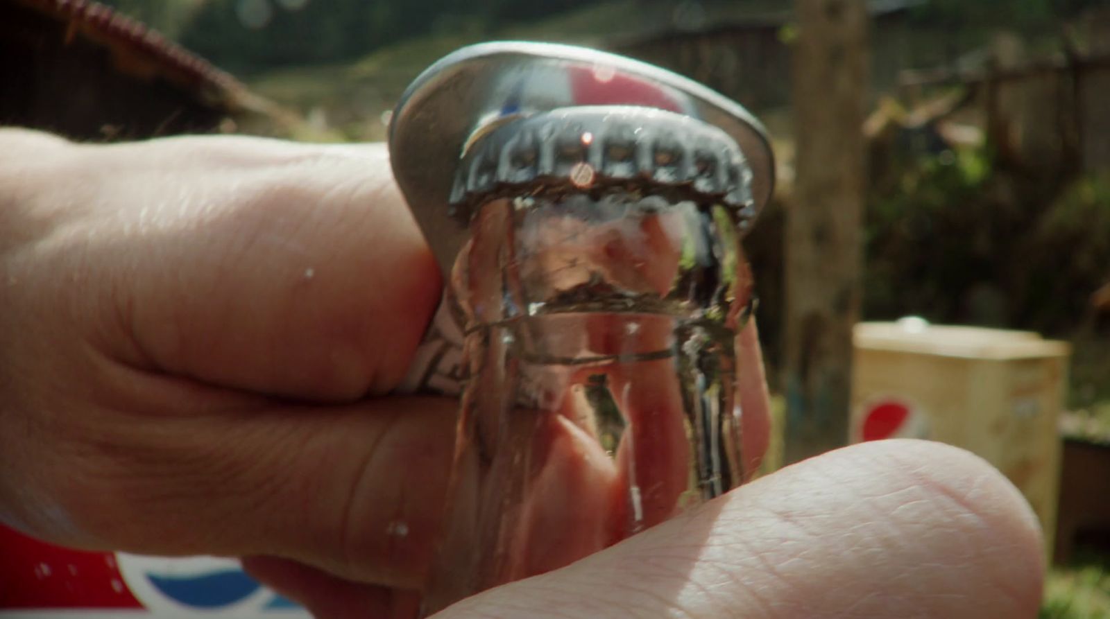 a close up of a person holding a small object