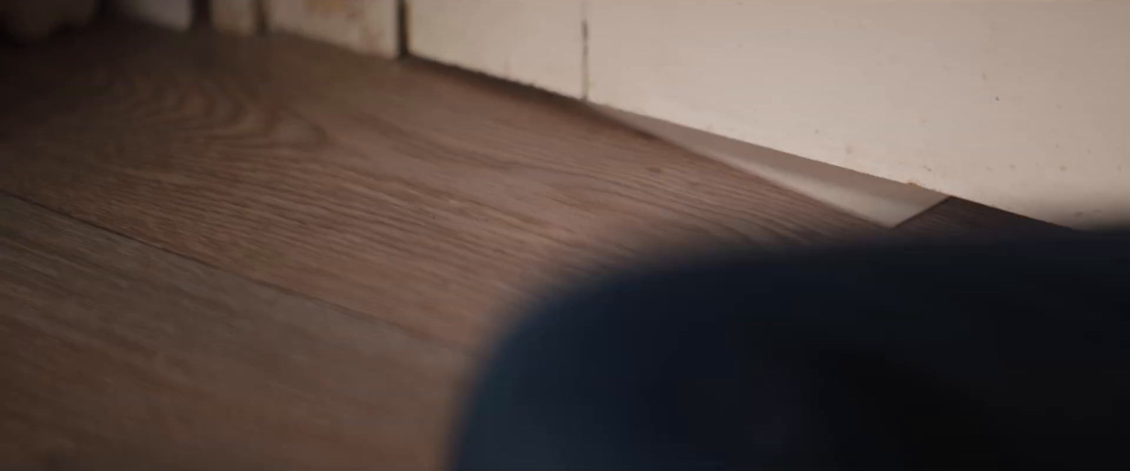 a close up of a wooden floor in a room