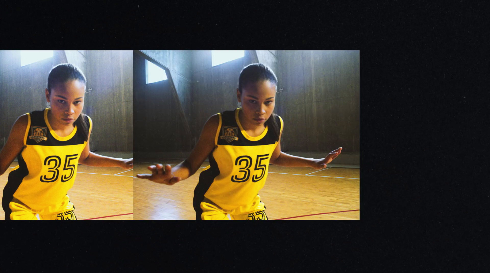 a woman in a yellow and black uniform is standing on a basketball court