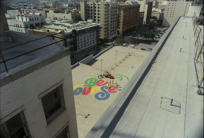 a skateboarder on a skateboard in front of a building