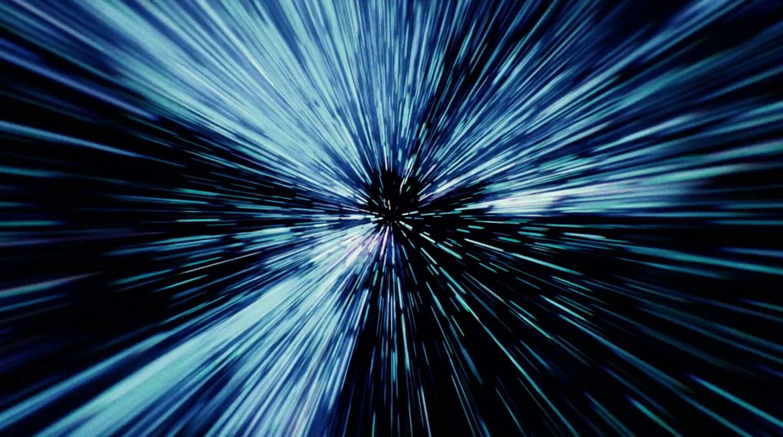 a blue and black background with a star burst