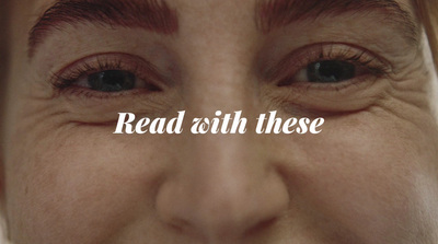 a close up of a person's face with the words read with these