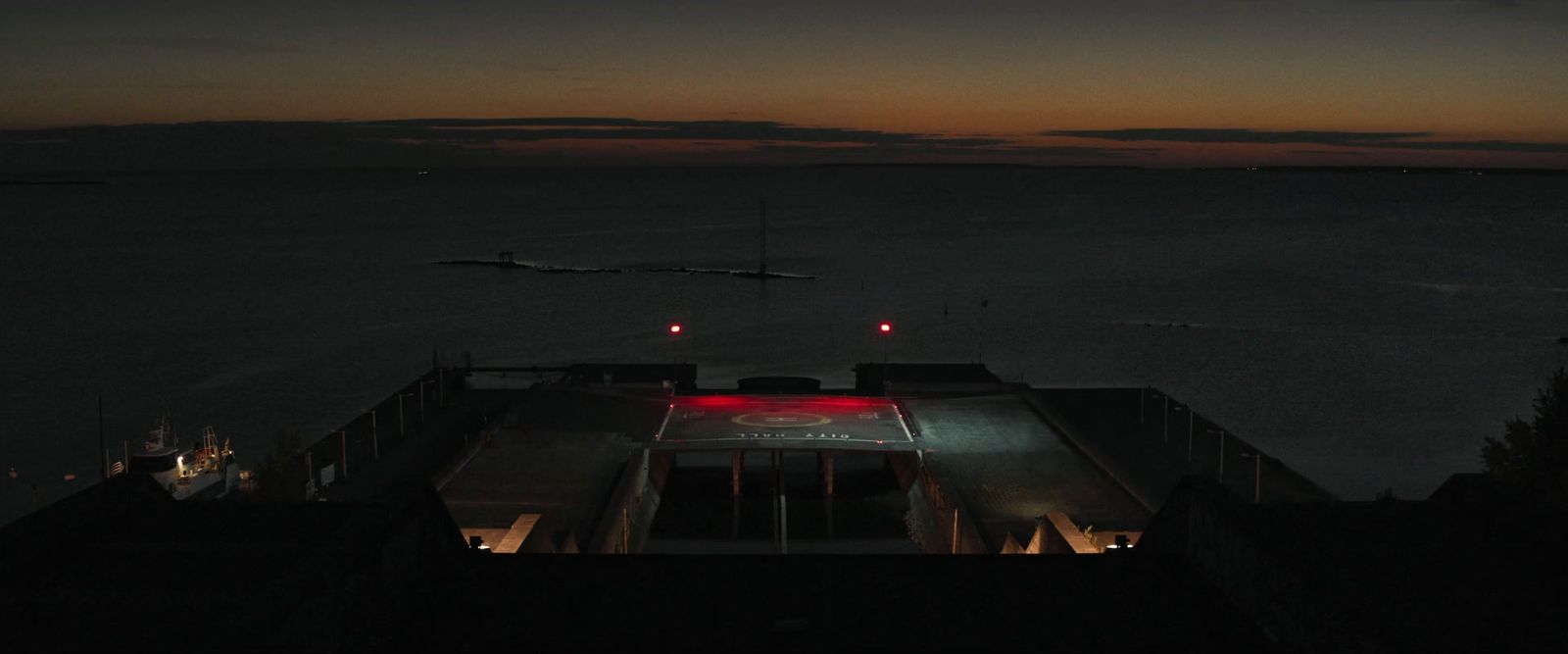 a view of a body of water at night