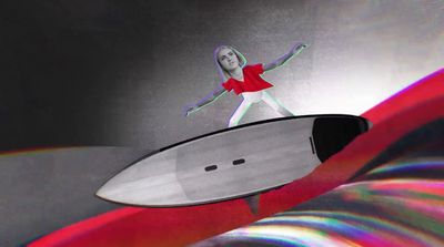 a woman is standing on a surfboard in the air