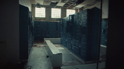 a room with a bunch of lockers in it