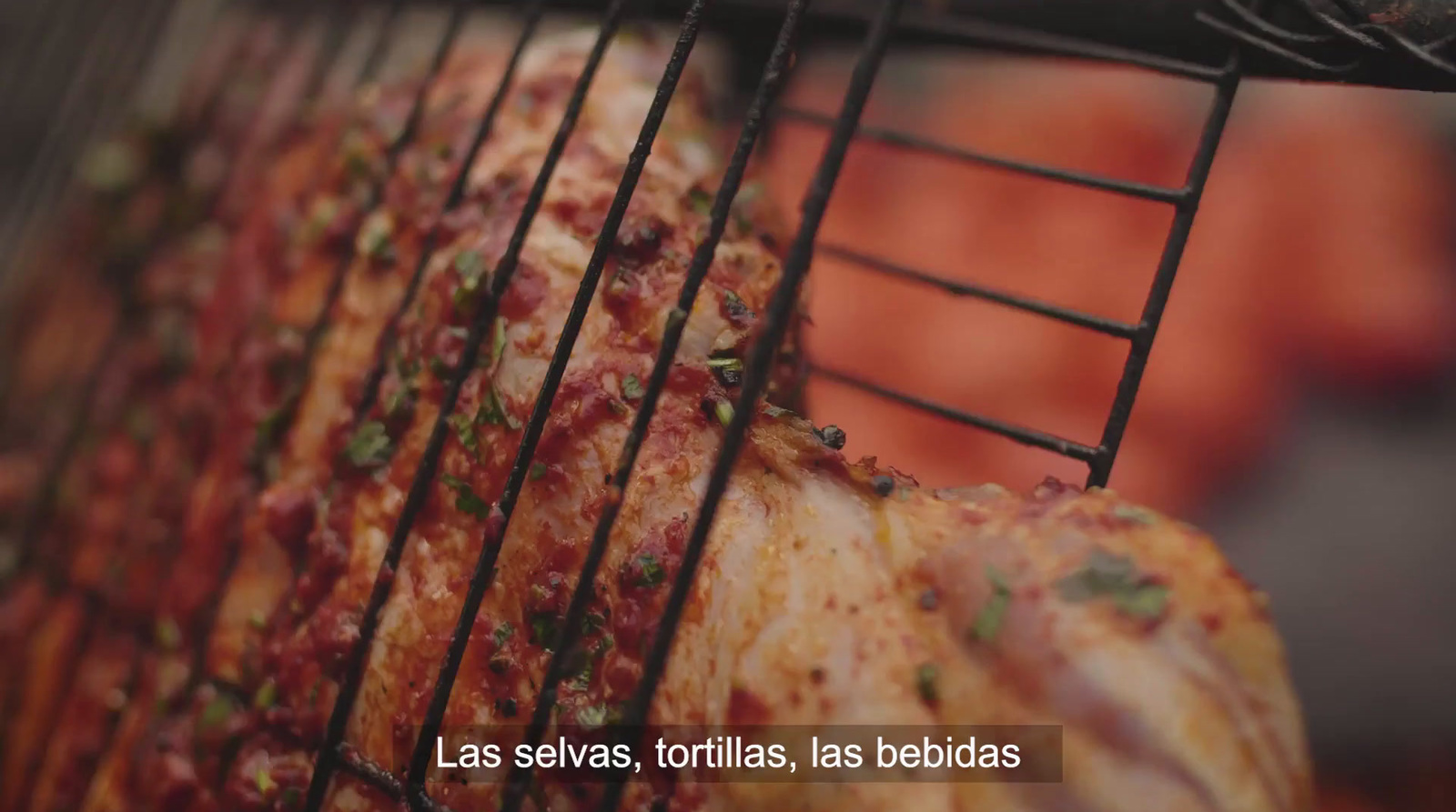 a close up of food cooking on a grill