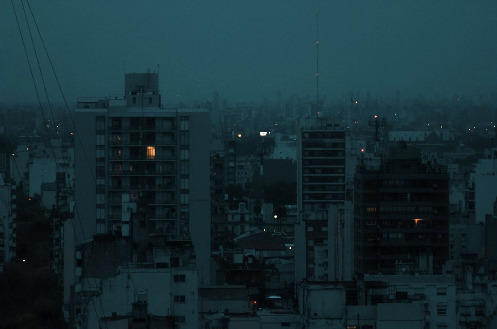 a view of a city at night from a tall building