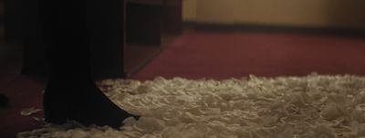 a close up of a person's feet on a rug