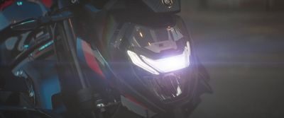 a close up of the headlight of a motorcycle