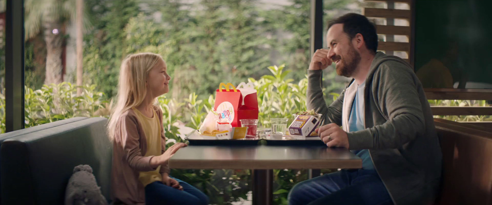 a man and a woman sitting at a table