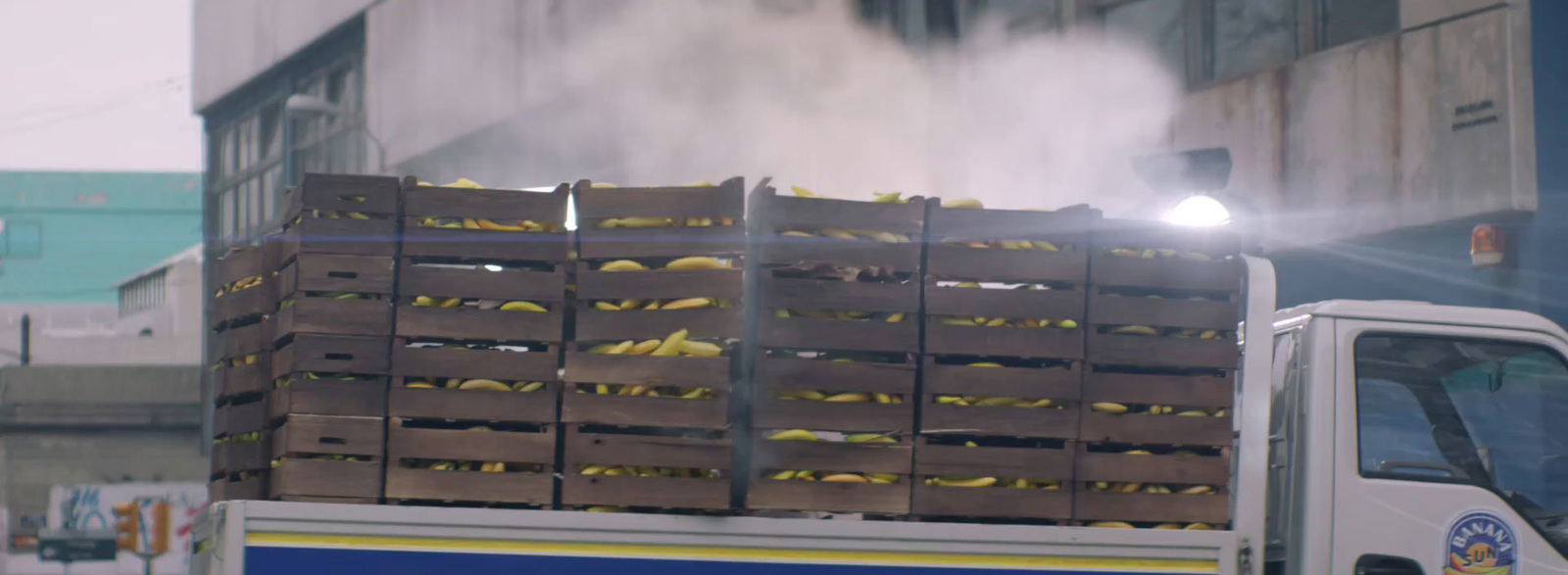 a truck with crates of bananas on it