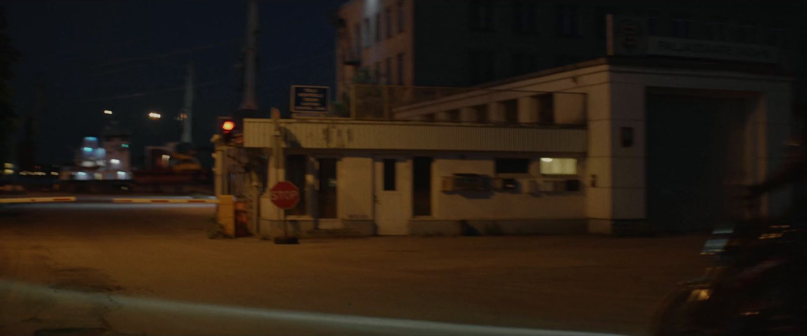 a stop light on a street corner at night