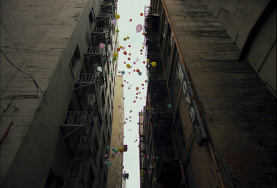 a group of balloons flying in the air