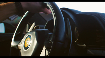 a close up of a steering wheel of a car